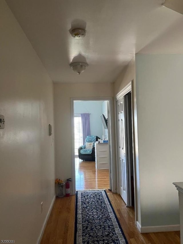 3 Harbor Front Ct Unit 3, Elizabeth City, NJ 07206 - corridor with wood finished floors and baseboards