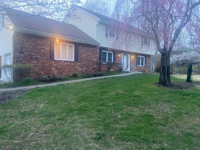31 Charlotte Dr, Clinton Twp, NJ 08833 - traditional home with brick siding and a front yard
