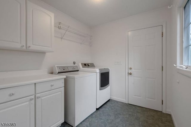 31 Charlotte Dr, Clinton Twp, NJ 08833 - laundry area with washing machine and clothes dryer, cabinet space, and baseboards