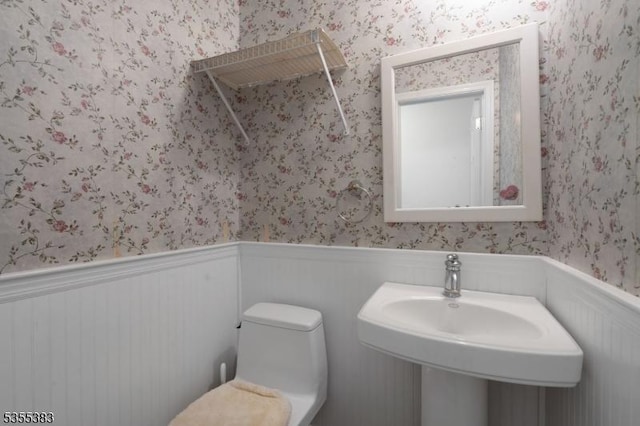 31 Charlotte Dr, Clinton Twp, NJ 08833 - half bathroom with wainscoting, wallpapered walls, and toilet