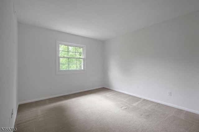 31 Charlotte Dr, Clinton Twp, NJ 08833 - spare room featuring carpet flooring and baseboards