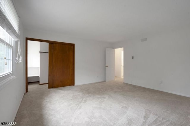 31 Charlotte Dr, Clinton Twp, NJ 08833 - unfurnished bedroom featuring carpet flooring and a closet