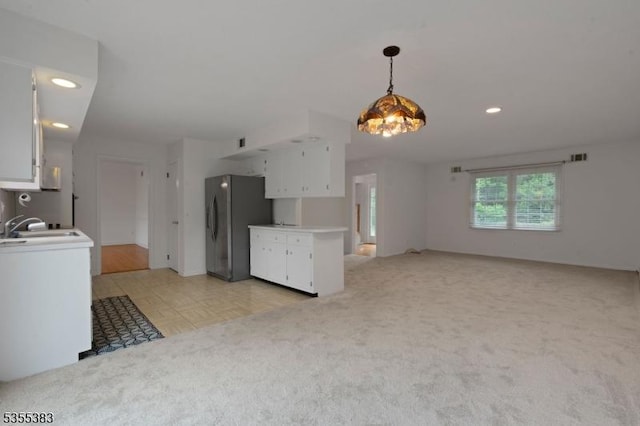 31 Charlotte Dr, Clinton Twp, NJ 08833 - unfurnished living room featuring light colored carpet, a sink, and recessed lighting