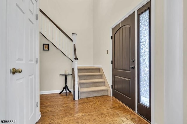 95 School House Rd, Jefferson Twp, NJ 07438 - foyer entrance with stairs, light wood-style flooring, and baseboards