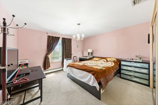 carpeted bedroom with a chandelier and a baseboard heating unit