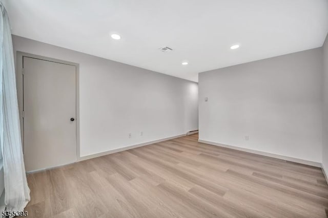 42B Catalpa Plz Unit B, Monroe Twp, NJ 08831 - empty room featuring light wood-type flooring, baseboards, and recessed lighting