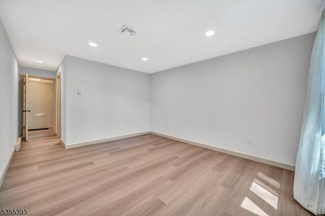 42B Catalpa Plz Unit B, Monroe Twp, NJ 08831 - spare room featuring light wood finished floors, baseboards, and recessed lighting