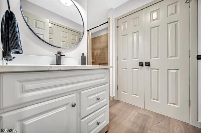 42B Catalpa Plz Unit B, Monroe Twp, NJ 08831 - bathroom featuring vanity, wood finished floors, and a shower with shower curtain
