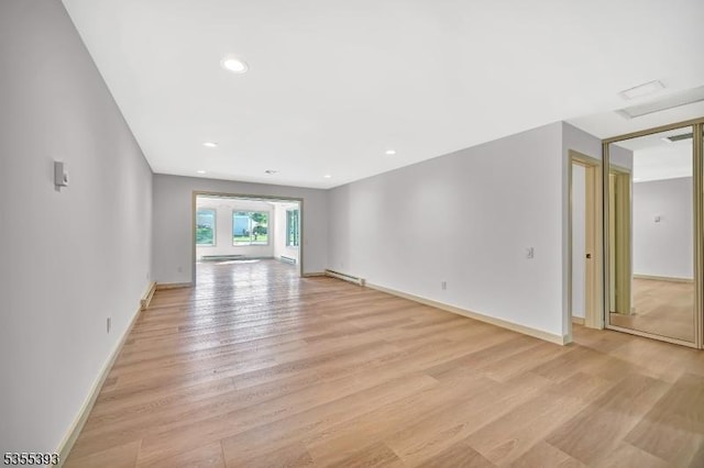 42B Catalpa Plz Unit B, Monroe Twp, NJ 08831 - unfurnished living room with a baseboard radiator, light wood-style floors, baseboards, and recessed lighting