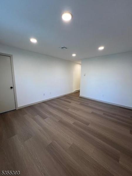 42B Catalpa Plz Unit B, Monroe Twp, NJ 08831 - empty room with wood finished floors, recessed lighting, and baseboards