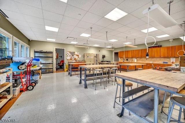 42B Catalpa Plz Unit B, Monroe Twp, NJ 08831 - dining area with a paneled ceiling and a workshop area