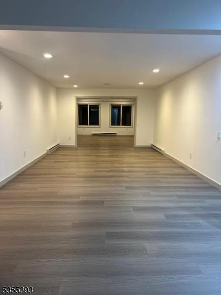 42B Catalpa Plz Unit B, Monroe Twp, NJ 08831 - empty room with baseboards, recessed lighting, and wood finished floors