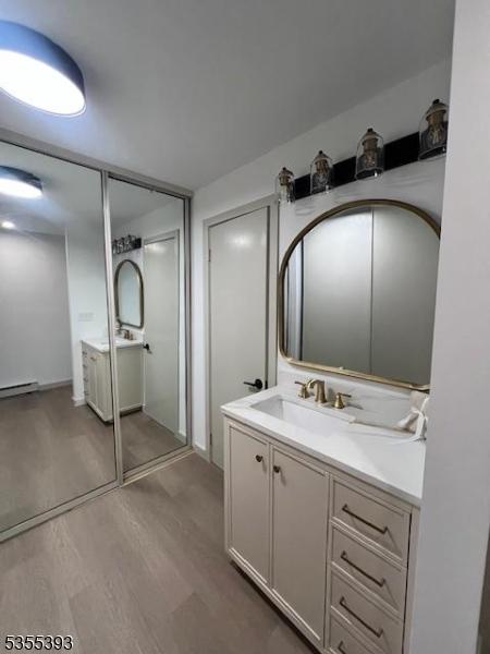 42B Catalpa Plz Unit B, Monroe Twp, NJ 08831 - bathroom with wood finished floors and vanity