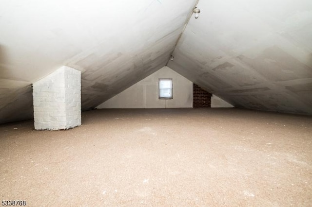 bonus room with vaulted ceiling