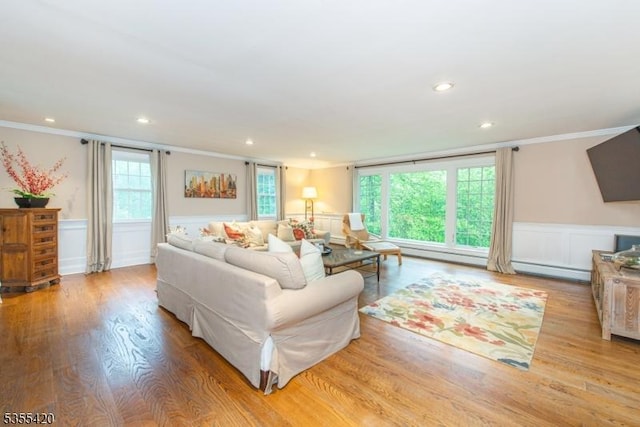59 Green Hill Rd, Kinnelon Boro, NJ 07405 - living room featuring crown molding, recessed lighting, wainscoting, wood finished floors, and a baseboard heating unit