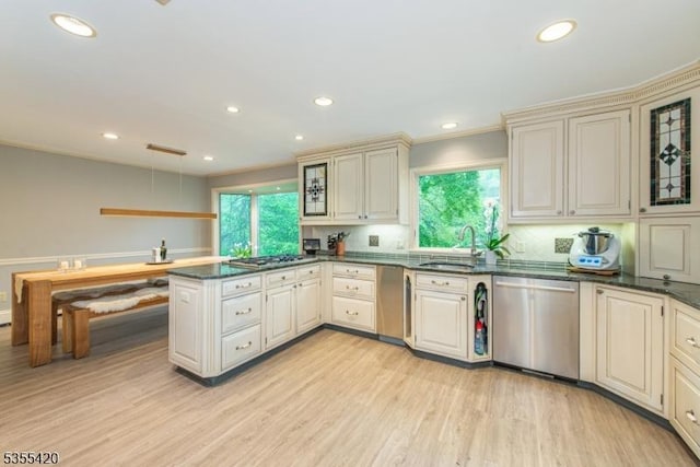 59 Green Hill Rd, Kinnelon Boro, NJ 07405 - kitchen featuring appliances with stainless steel finishes, a peninsula, plenty of natural light, light wood-type flooring, and recessed lighting