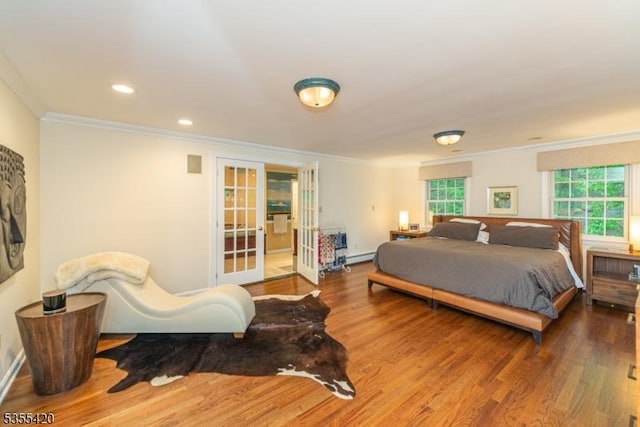 59 Green Hill Rd, Kinnelon Boro, NJ 07405 - bedroom featuring ornamental molding, wood finished floors, french doors, a baseboard radiator, and recessed lighting