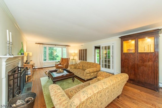 59 Green Hill Rd, Kinnelon Boro, NJ 07405 - living room with crown molding, hardwood / wood-style floors, plenty of natural light, and a fireplace with raised hearth