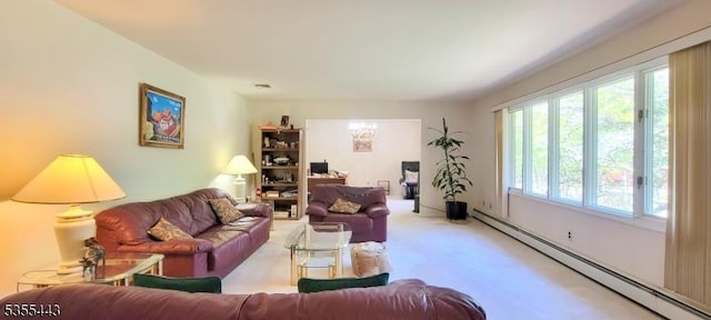 living room with baseboard heating and light colored carpet