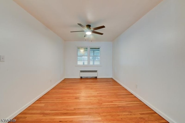 377 Delaware Ave, Union Twp, NJ 07083 - unfurnished room with radiator, a ceiling fan, and light wood finished floors
