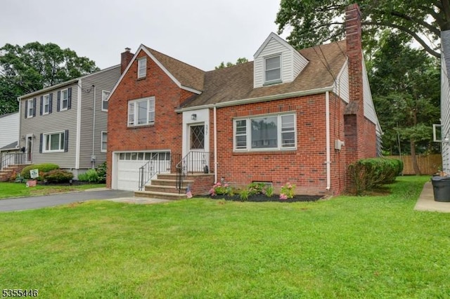 377 Delaware Ave, Union Twp, NJ 07083 - view of front facade with brick siding, asphalt driveway, a chimney, and an attached garage