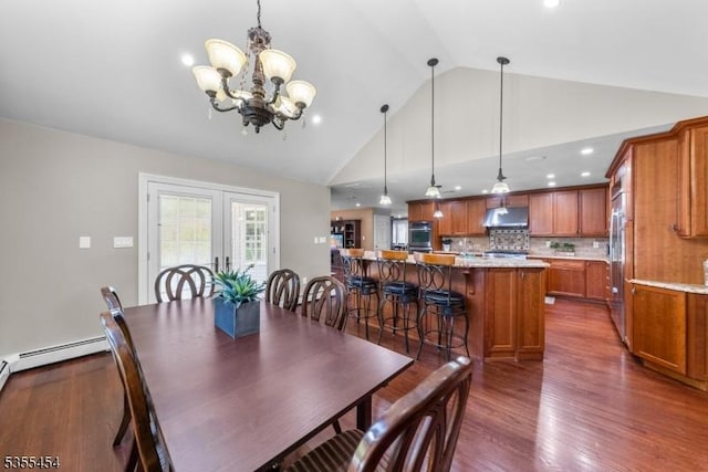 dining room with an inviting chandelier, high vaulted ceiling, dark wood finished floors, french doors, and recessed lighting