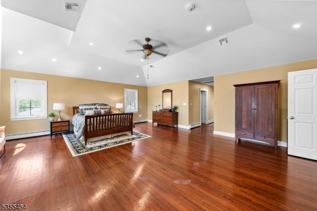bedroom featuring visible vents, a baseboard radiator, and lofted ceiling
