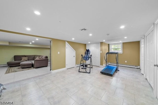 workout area with baseboards, a baseboard heating unit, recessed lighting, and visible vents