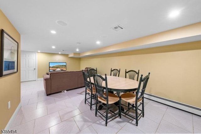 dining room with baseboards, a baseboard radiator, recessed lighting, and visible vents