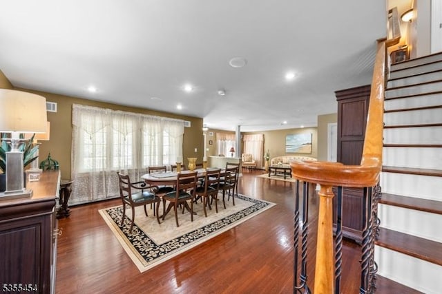 dining room featuring recessed lighting, visible vents, stairway, and dark wood-type flooring
