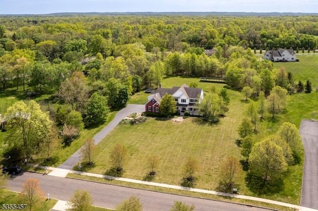 aerial view featuring a forest view