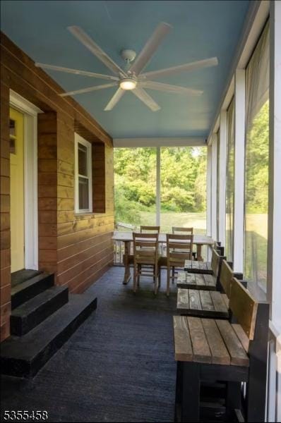 14 Luchetti Way, Andover Twp, NJ 07860 - sunroom / solarium featuring wooden walls, a ceiling fan, carpet, and entry steps