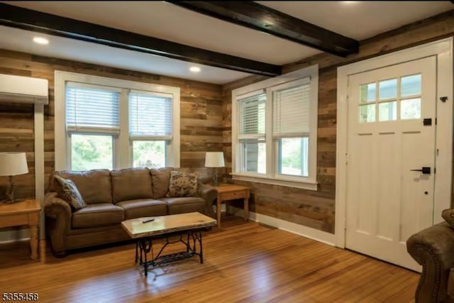 14 Luchetti Way, Andover Twp, NJ 07860 - living room with wooden walls, beamed ceiling, wood finished floors, and a wealth of natural light