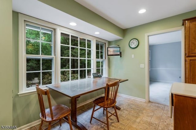 1178 Delaware Dr, Bridgewater Twp, NJ 08807 - dining area featuring baseboards, light stone finish flooring, and recessed lighting