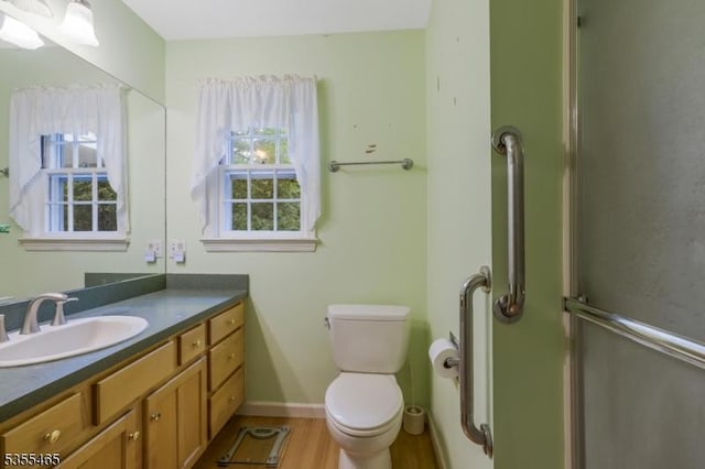 1178 Delaware Dr, Bridgewater Twp, NJ 08807 - full bathroom with toilet, vanity, and wood finished floors