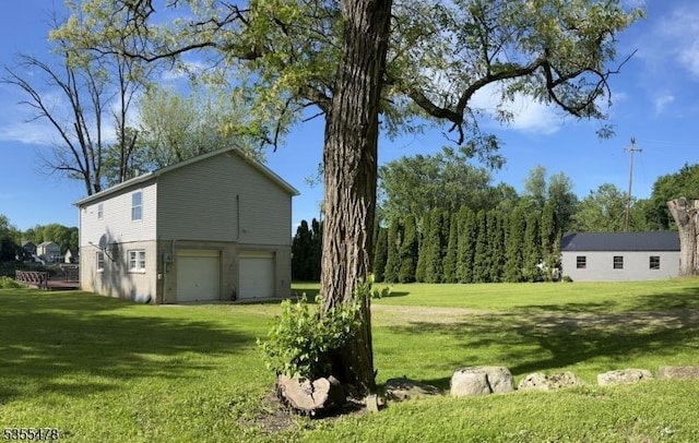 1 Lenape Ln, Harmony Twp, NJ 08865 - view of green lawn with an attached garage and driveway