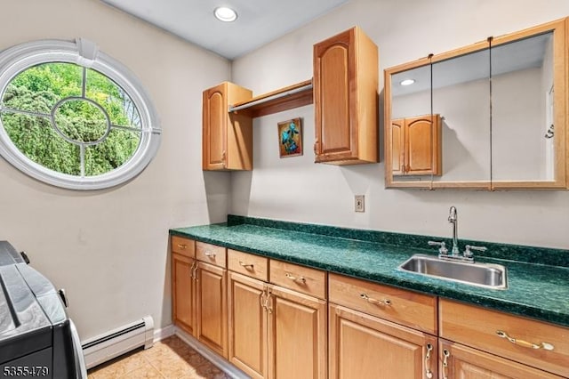 kitchen featuring a sink, a baseboard radiator, dark countertops, recessed lighting, and light tile patterned floors