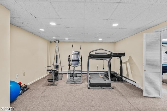 workout area featuring recessed lighting, baseboards, and carpet