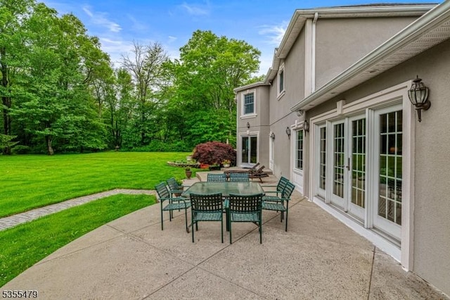 view of patio featuring outdoor dining area