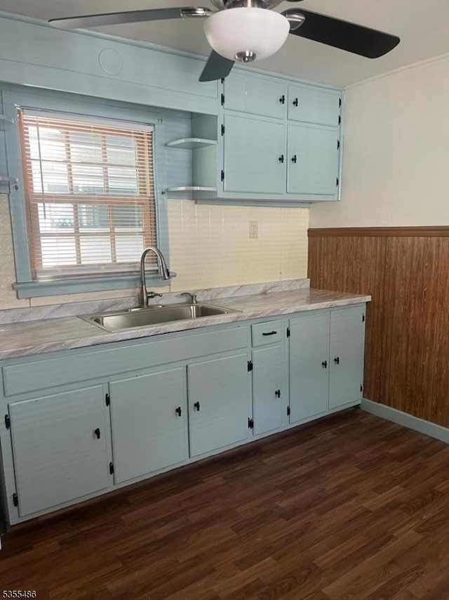 105 Chambers St, Phillipsburg Town, NJ 08865 - kitchen with a sink, a ceiling fan, dark wood-type flooring, light countertops, and a wainscoted wall