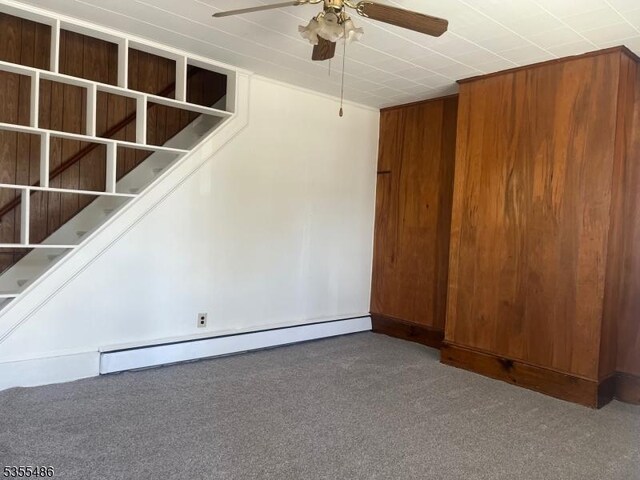 105 Chambers St, Phillipsburg Town, NJ 08865 - unfurnished living room featuring a baseboard radiator, carpet floors, and ceiling fan