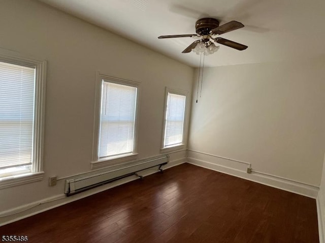 105 Chambers St, Phillipsburg Town, NJ 08865 - empty room featuring a baseboard radiator, a ceiling fan, dark wood-style flooring, and baseboards