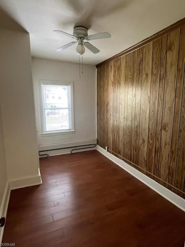 105 Chambers St, Phillipsburg Town, NJ 08865 - unfurnished room featuring wood walls, ceiling fan, wood finished floors, and baseboards