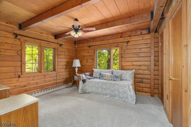 living area with a baseboard radiator, wood ceiling, carpet floors, beamed ceiling, and a ceiling fan