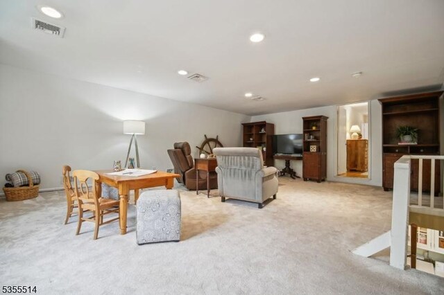 living area with carpet flooring and recessed lighting