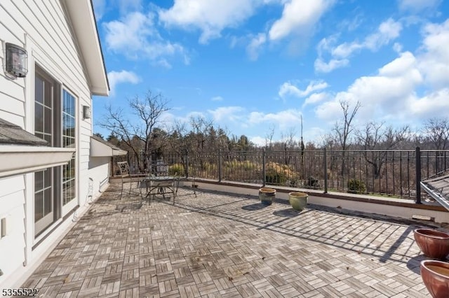 view of patio with fence