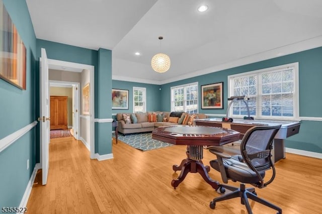 office space featuring baseboards, recessed lighting, and light wood finished floors