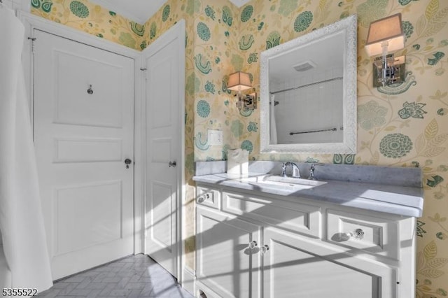 interior space with brick floor and wallpapered walls