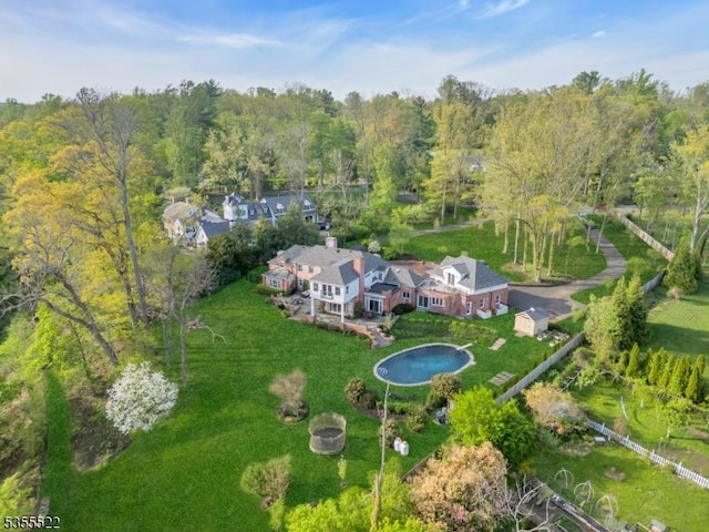 bird's eye view featuring a view of trees