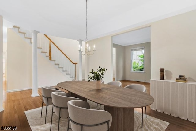 9 Apgar Ct, Raritan Twp, NJ 08822 - dining area with wood finished floors, stairway, a chandelier, and baseboards